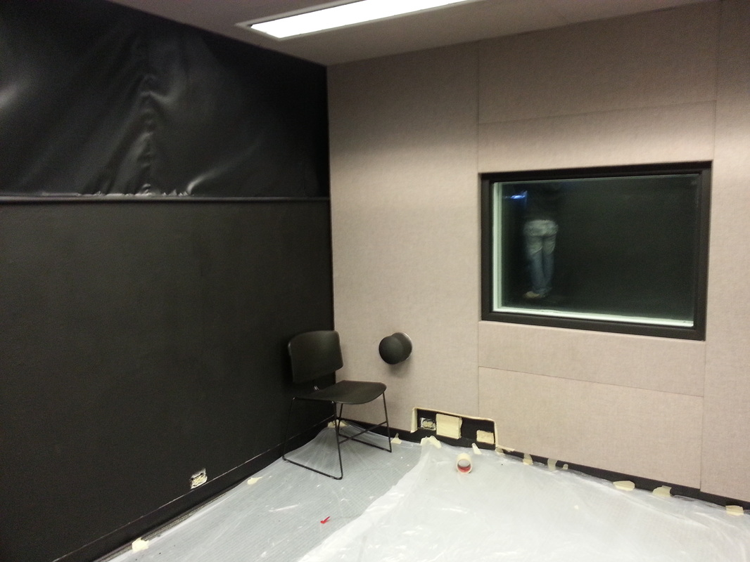 Room painted black to remove reflections and distractions